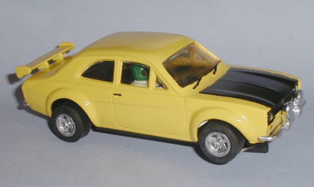 Escort_yellow_